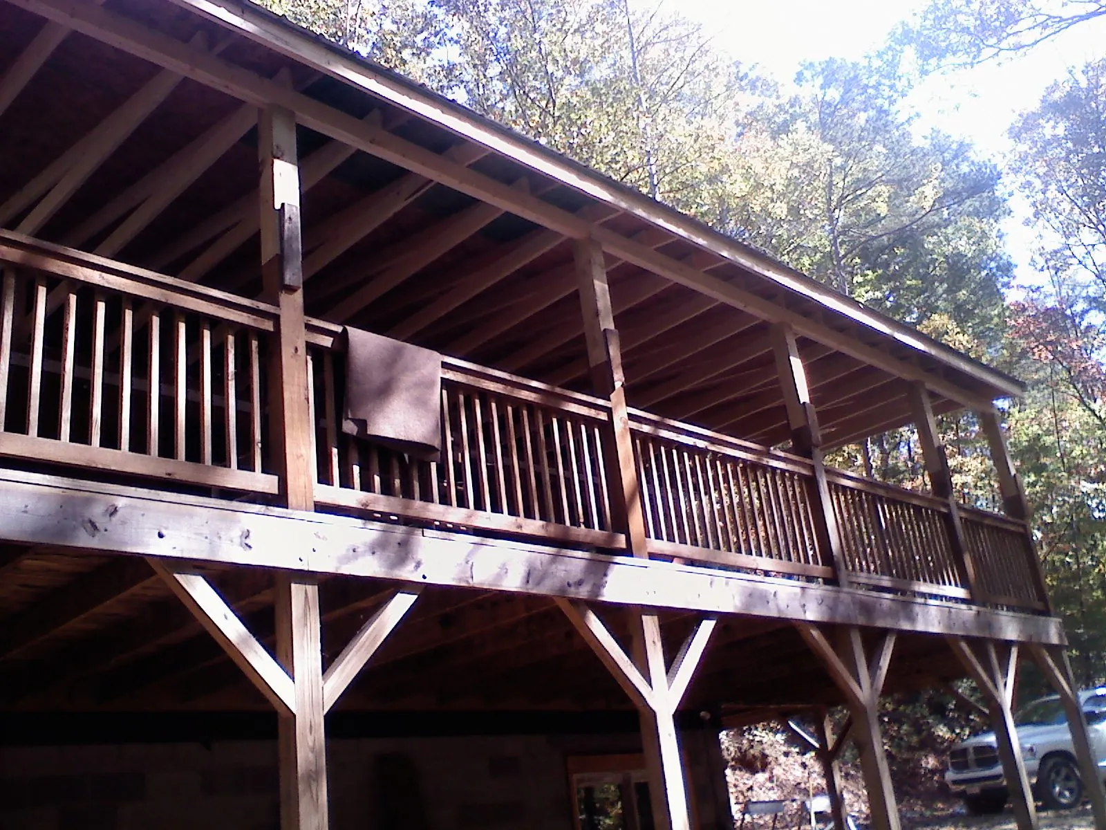 Timber framing under a new elevated porch and deck — Roof Leak Repair in North Henderson by Roofing Brothers